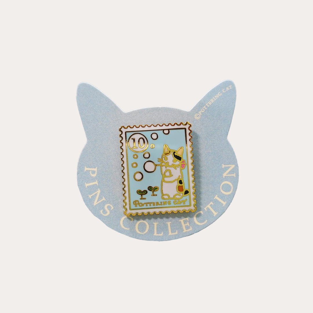 Cat Blowing Bubbles Stamp Enamel Pin