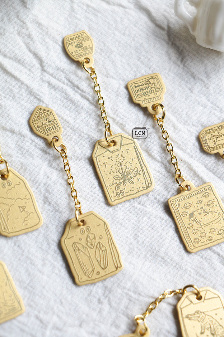 LCN Mystery Tea Bag Brass Charm