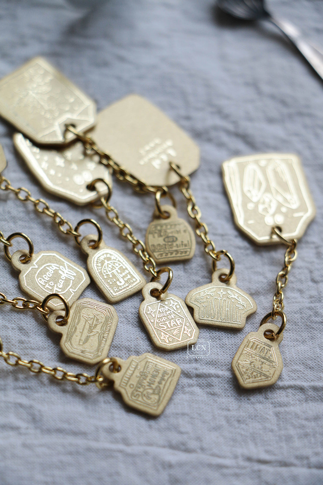 LCN Mystery Tea Bag Brass Charm